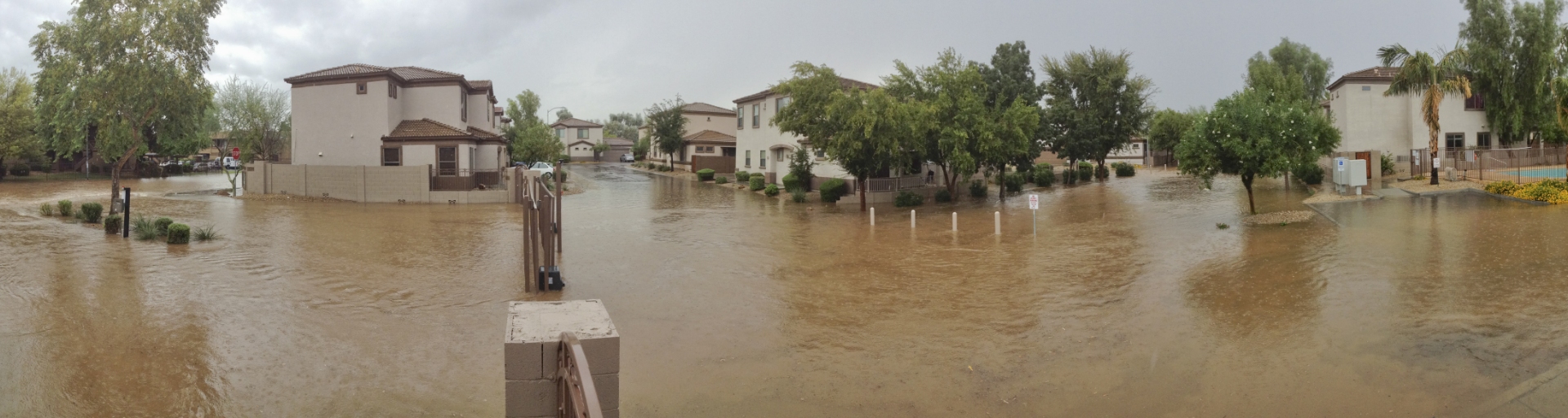 
		Flooded streets in residential area after monsoon		