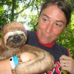 Sasha Reed holding a sloth
