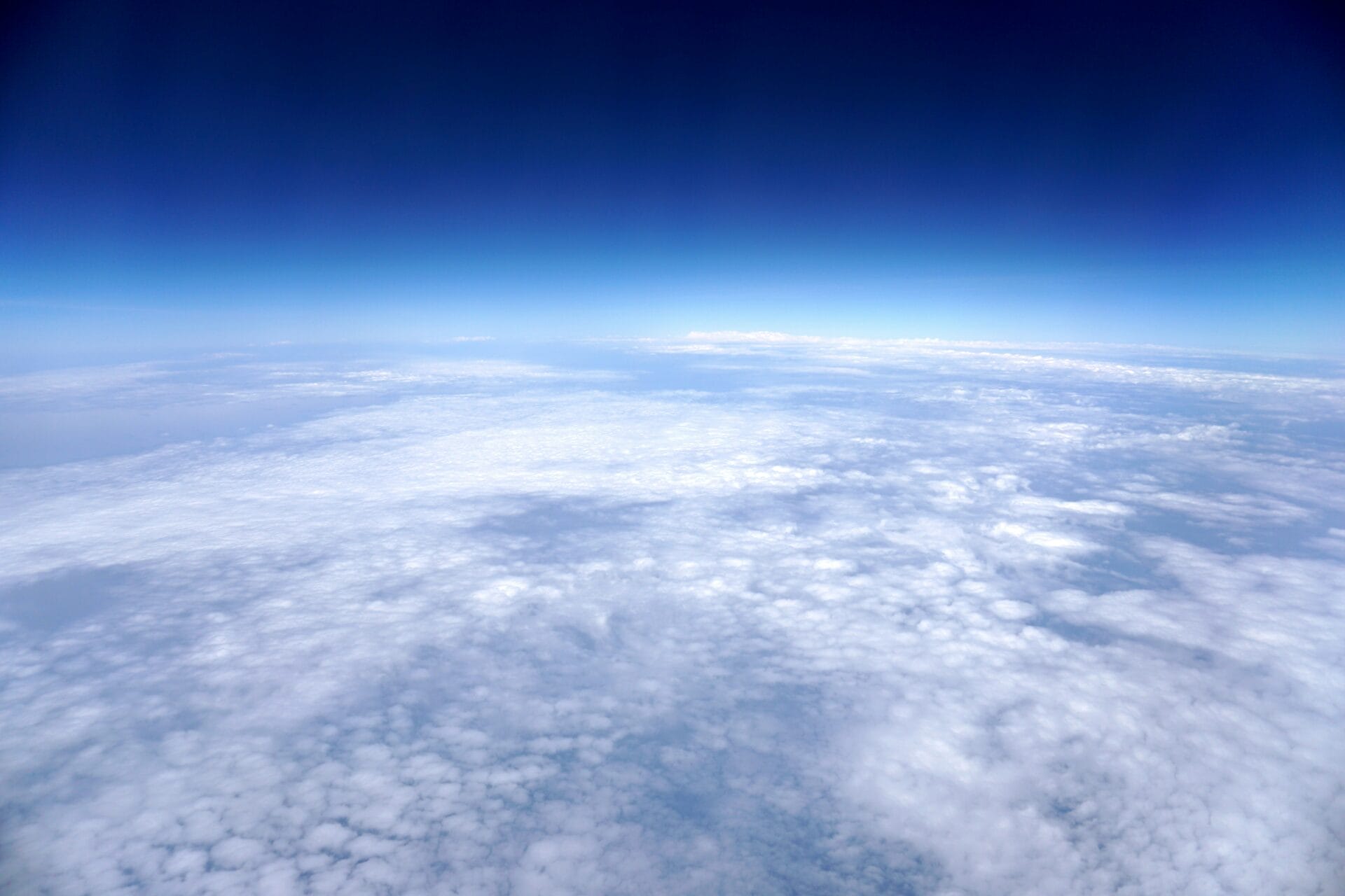 Clear Glass Ball by Rahul, this picture is taken from the sky and there is some cloud