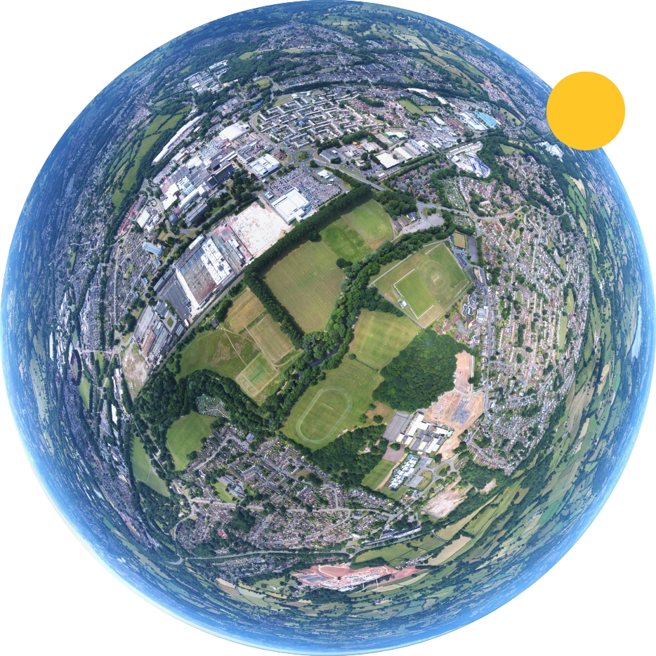 Fish-eye aerial view of an urban area.